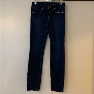 Skinny jean. Super stretch. Dark wash. Low rise.